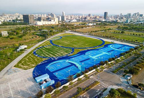 Taichung City, Taiwan - November 28, 2022 : Aerial view of Taichung Central Park public basketball court. Xitun District Shuinan Economic and Trade Area.