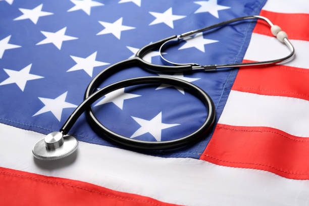 istock Closeup view of stethoscope on American flag 1453293861