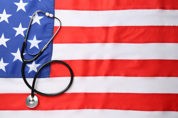 istock Stethoscope on American flag, top view. Space for text 1453293887