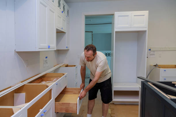 istock Working on the kitchen cabinet draw in a new home by a carpenter 1453306027