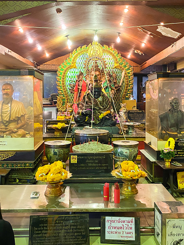 Bangkok Thailand - 28 Dec 2022: Many people praying to lord ganesh at Ganesha shrine or Phra Pikanet Temple in Huai Khwang Night Market Bangkok