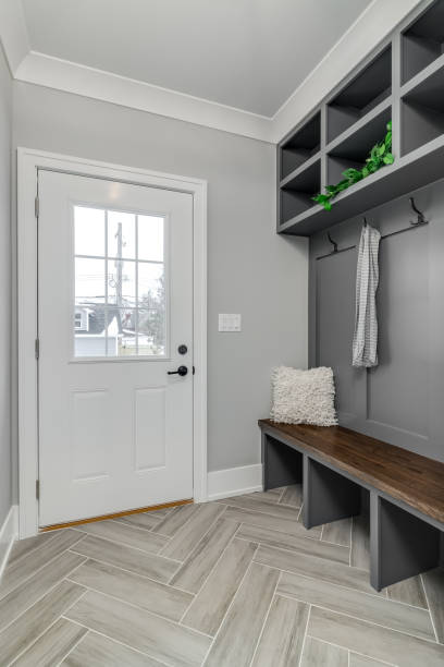 istock A mudroom entryway with a bench seat and storage. 1453308041