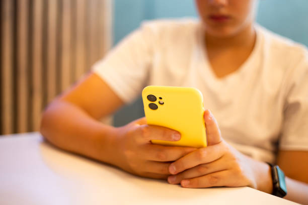 istock Teenage boy surfing the internet 1453311175
