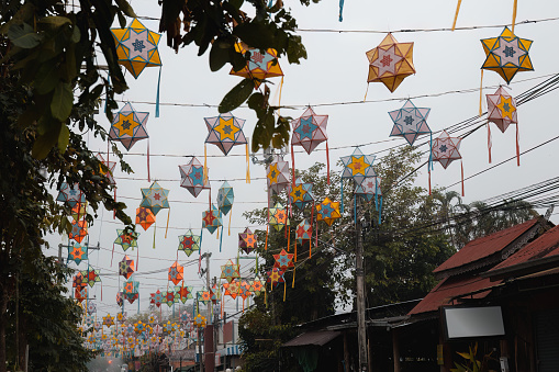Colorful paper lanterns above the street in Pai, Thailand