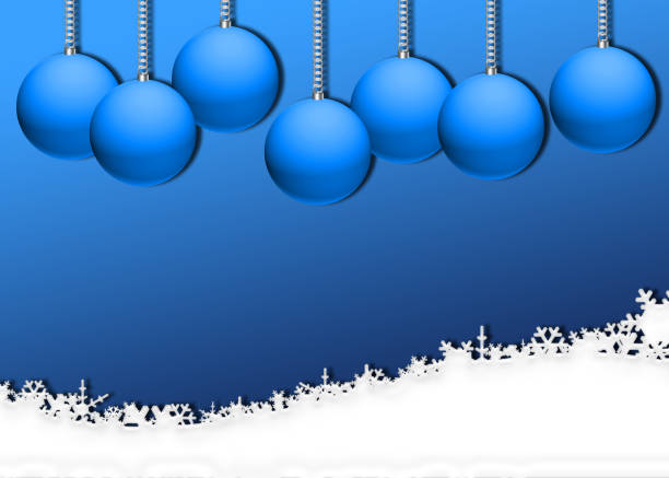 Snow Christmas winter background with blue spheres hanging from the chain