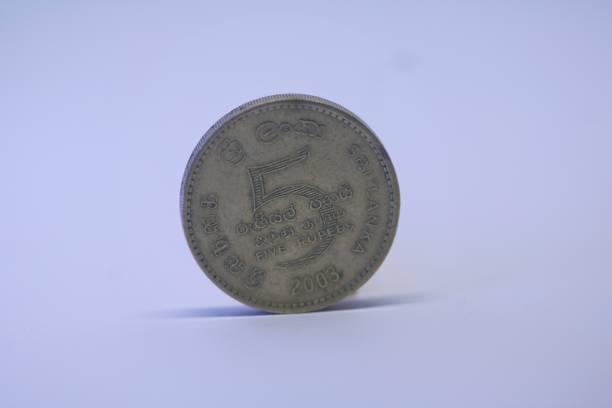 istock tail or back end of a Sri Lankan 5 rupee coin. 1453313639