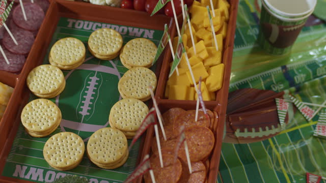 Edited Time-laps building Super Bowl food party platter