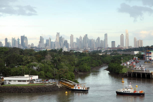 Panama is a country located on the isthmus that joins Central and South America. The Panama Canal, a famous engineering landmark, runs through its center, joining the Atlantic and Pacific oceans to create a crucial shipping route. In the capital, Panama City, modern skyscrapers, casinos and nightclubs contrast with the colonial buildings of the Casco Viejo district and the tropical forest of the Metropolitan Natural Park.