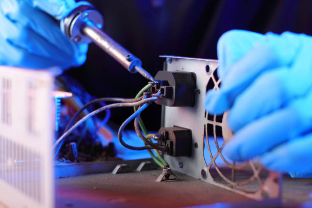 istock disassembly of a computer power supply on a table 1453315887