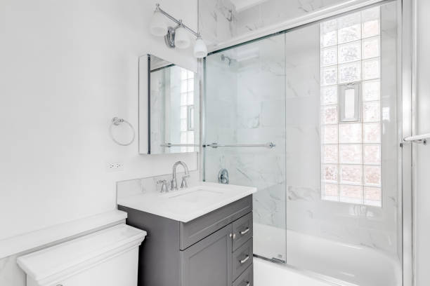 istock A bathroom with a grey cabinet and marble shower. 1453318129