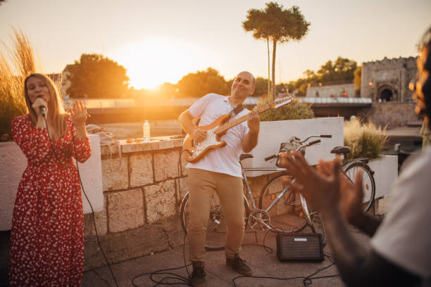 istock Man watching street musicians 1453325958