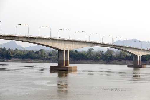 Third thai laos friendship bridge at Mekong river north of Nakhon Phanom in east Thailand at early morning