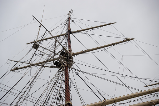 The mast photographed against a cloudy sky