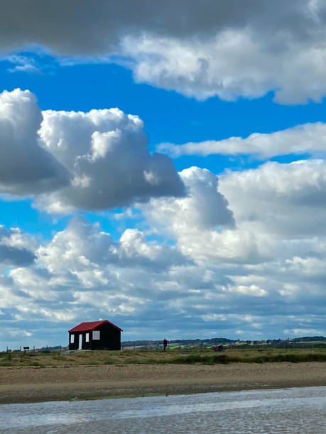 istock Red roofed hut, Sussex UK 1453329436