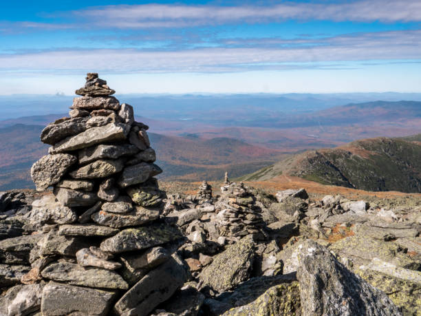 Mt Washington Cairns Rock cairns line the Appalachian trail at the summit of Mt Washington. cairn stock pictures, royalty-free photos & images