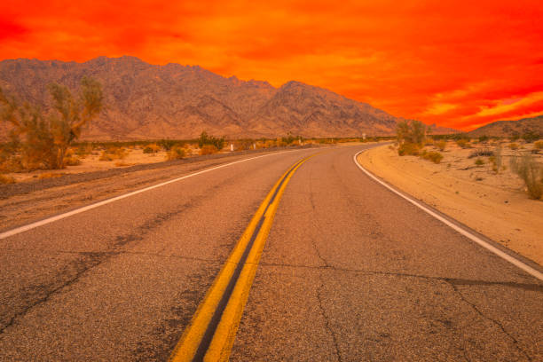 Mojave National Preserve Desert Wilderness Landscape Series at dusk, Dramatic orange cloudscape over Needles Highway and Providence Mountains, in Needles, California, USA