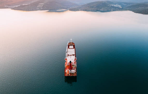 istock Aerial View Cargo Ship Waiting to Enter the Port 1453336272