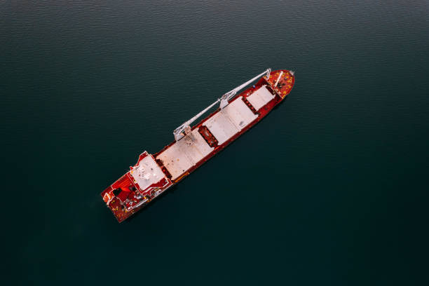 istock Aerial View Cargo Ship Waiting to Enter the Port 1453336401