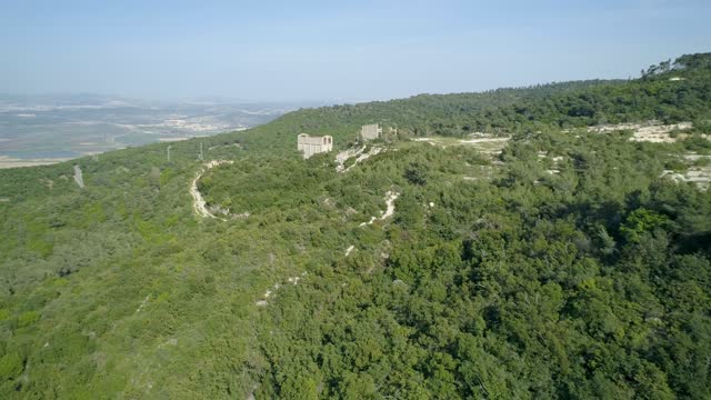 Aerial view of an abandoned building in a woodlands, Carmel Forest, Haifa, Israel