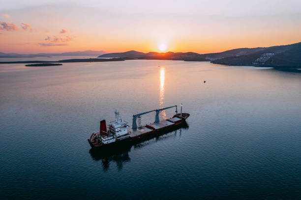 istock Aerial View Cargo Ship Waiting to Enter the Port 1453338272