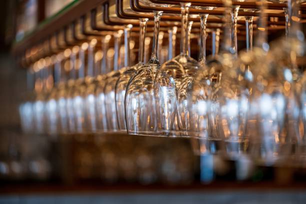 istock Beautiful view of hung wine glasses for background use 1453338324
