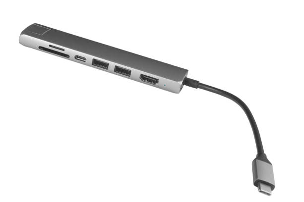 istock USB Type C adapter hub with hdmi, ethernet, HDMI, USB, SD microSD cables. Converter cables for computers and smartphones isolated on white background 1453340995