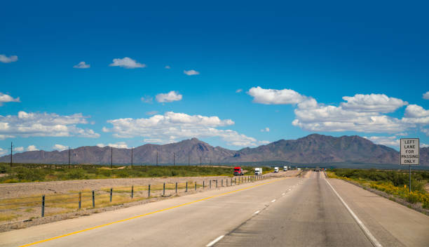 istock Highway alongside hills in Texas, USA 1453342056
