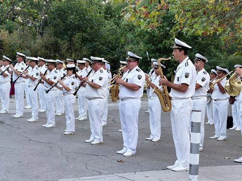 Limassol, Cyprus, October 28th, 2023: Youth brass band marching along  Archbishop Makarios III Avenue during Ohi Day parade