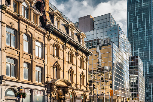 Ornate old-fashioned and glass facades on Yonge Street in downtown Toronto, Ontario, Canada