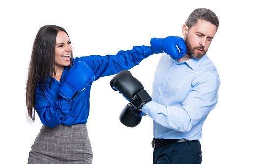 business opposition of businesspeople in boxing gloves. business knockout. businesspeople opposition isolated on white. knockout in business opposition. businesspeople in studio. business knockout