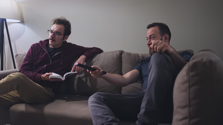 Gay Male Showing His Partner Interesting Television Channels