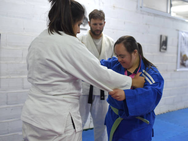 istock women with teacher training judo 1453355216