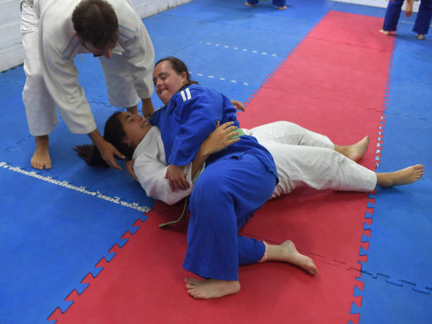 istock women with teacher training judo 1453355242