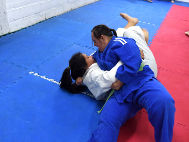 istock women with teacher training judo 1453355255
