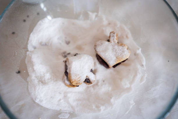 Sweet cookies with jam and powder sugar