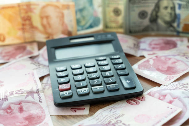 istock US dollar, Turkish lira and calculator 1453358221