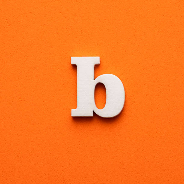 istock White lowercase letter b on orange foamy background 1453358631