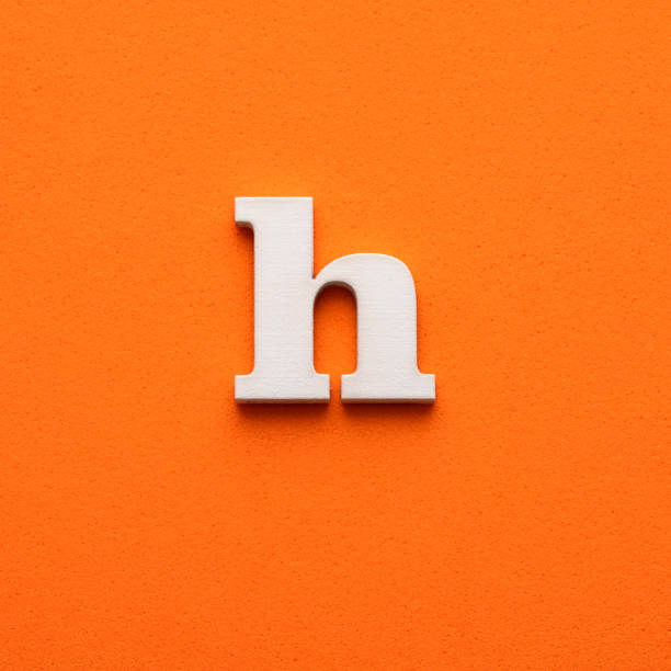 istock White lowercase letter h on orange foamy background 1453359176