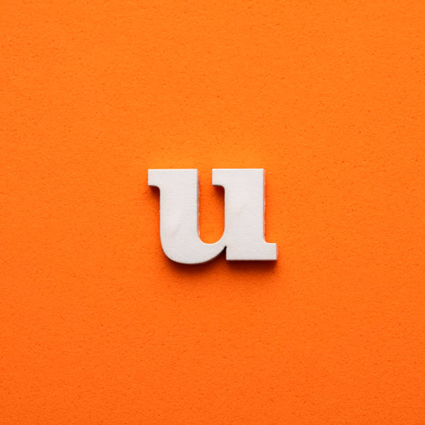 istock White lowercase letter u on orange foamy background 1453359284