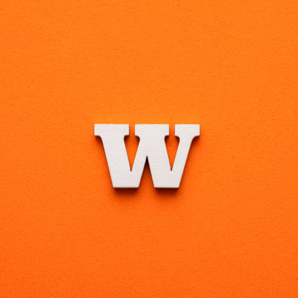 istock White lowercase letter w on orange foamy background 1453359287