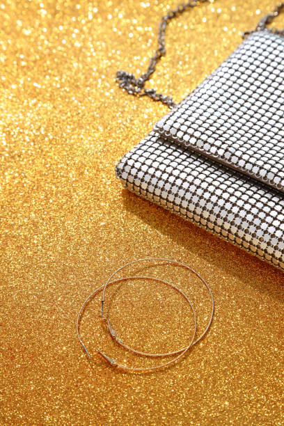 istock Glitter shiny purse clutch, copy space 1453366715
