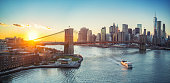 istock Brooklyn bridge and Manhattan at sunset 1453367888