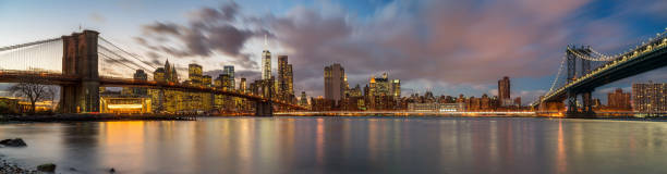 istock Brooklyn bridge and Manhattan bridge at dusk 1453367894