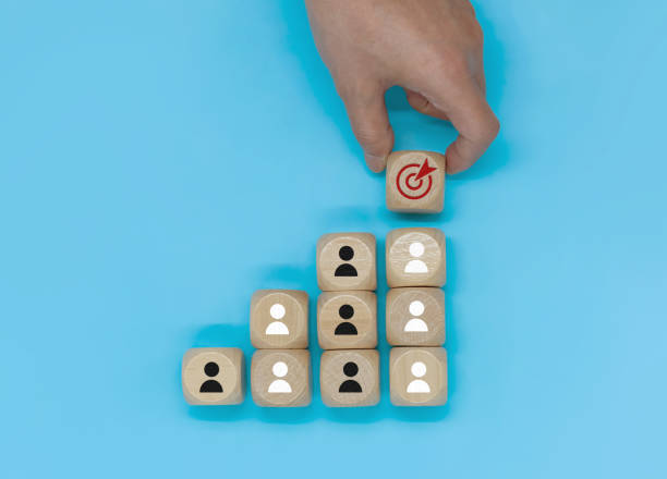 istock work together with one's team members toward one's goal 1453368670