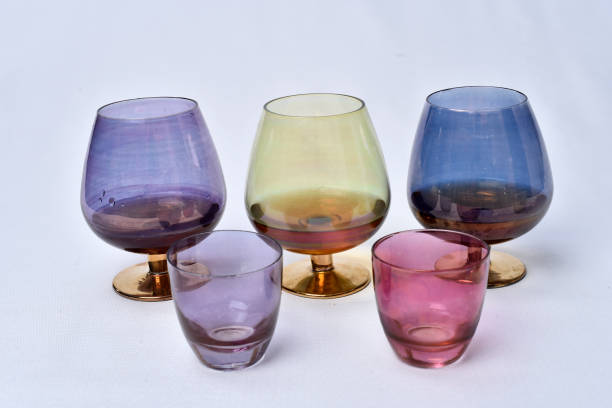 istock colored glass goblet with cognac and cheese 1453372645