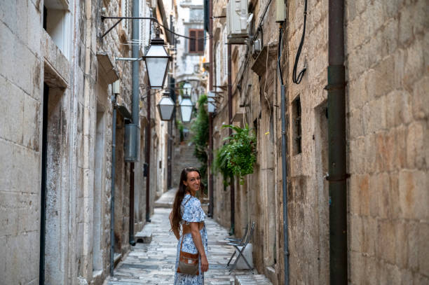 istock Woman exploring Dubrovnik, Croatia 1453374284
