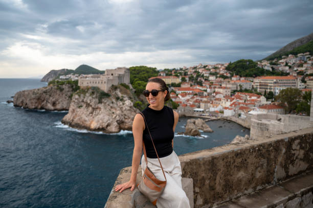 istock Woman exploring Dubrovnik, Croatia 1453374318
