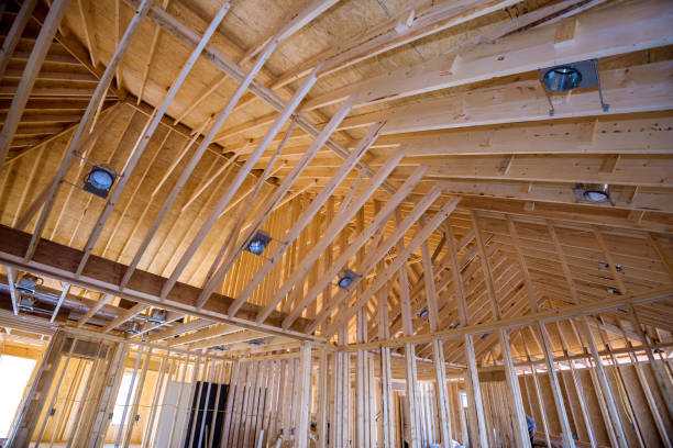 istock The lighting lamp is mounted into the ceiling of a newly constructed home. Installed the light lamp into the ceiling 1453374697