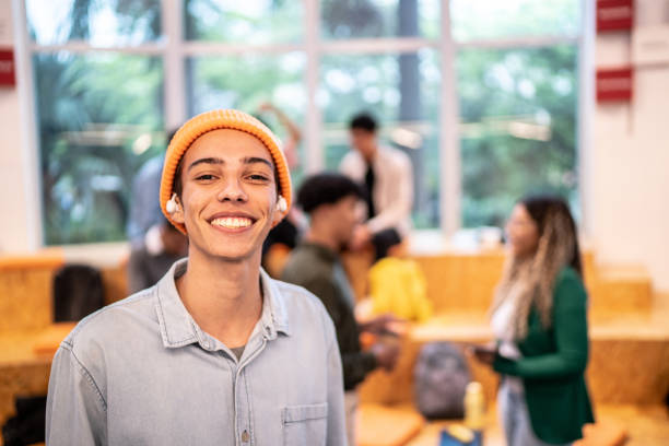 istock Portrait of a young student man at university auditorium 1453378007