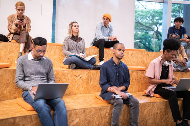 istock University students or business people watching a lecture at auditorium 1453378068